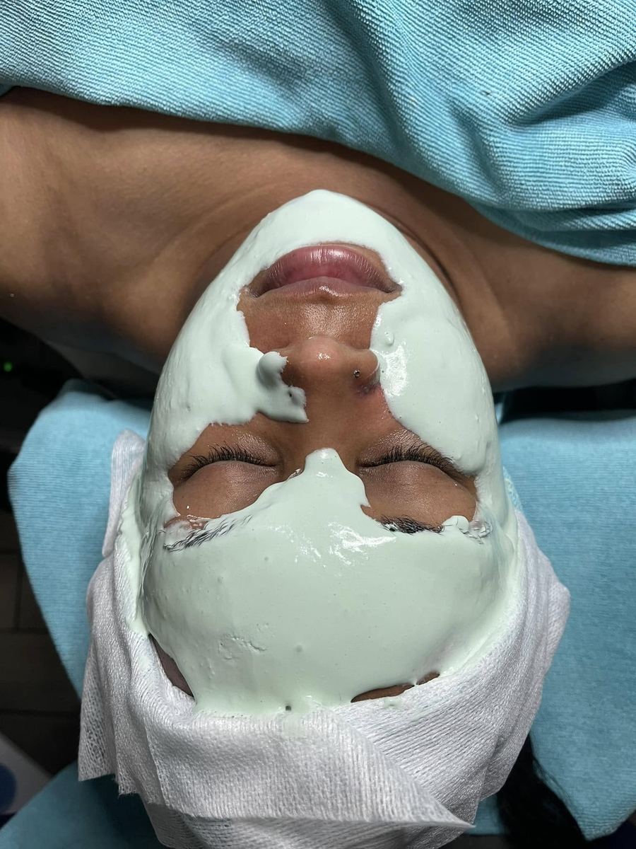 Client relaxing under a custom masque